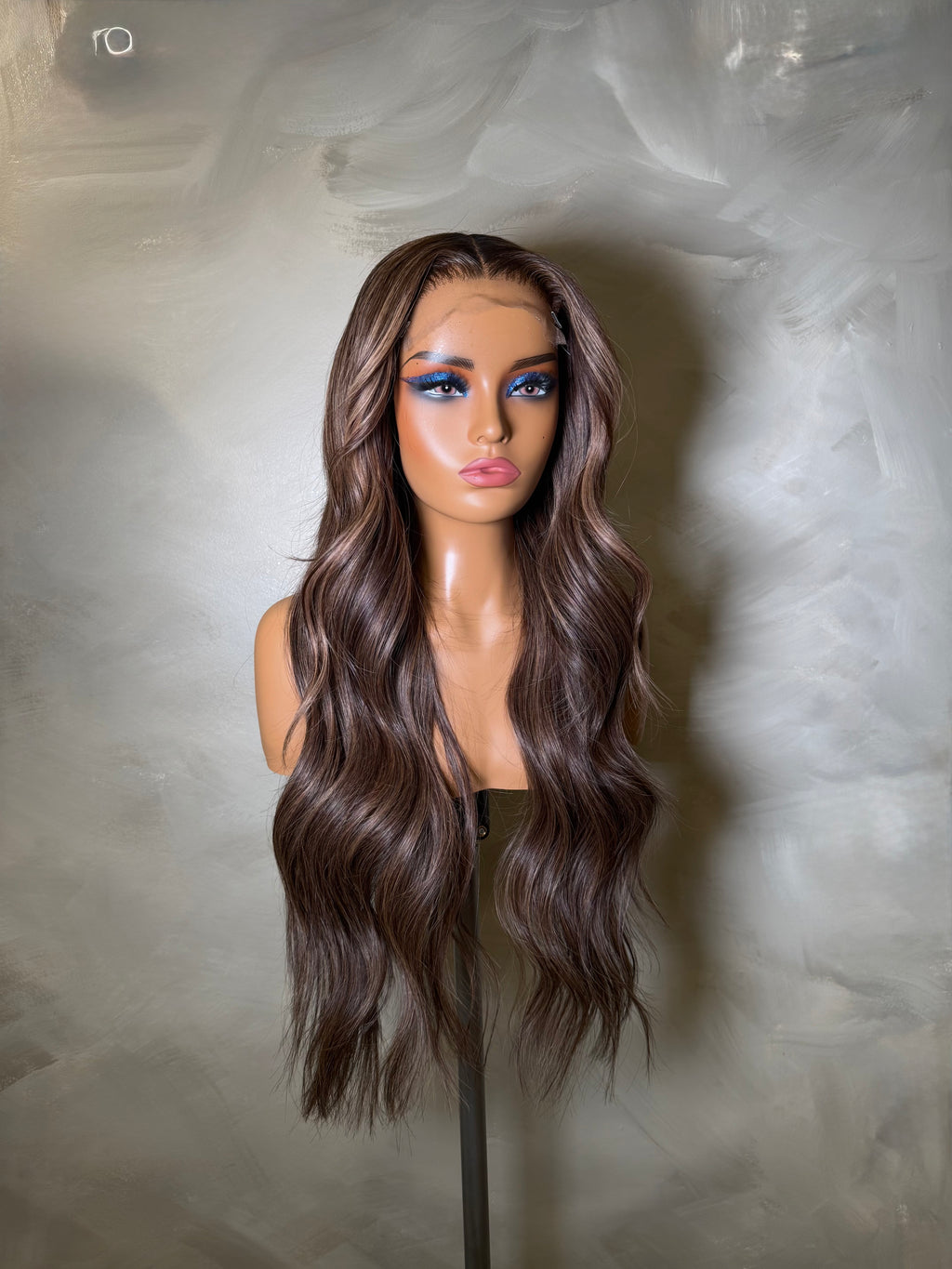 Mannequin head with long wavy brown wig on a plain background, Caramel Balayage, chocolate brown HD 5x5 glueless closure wig